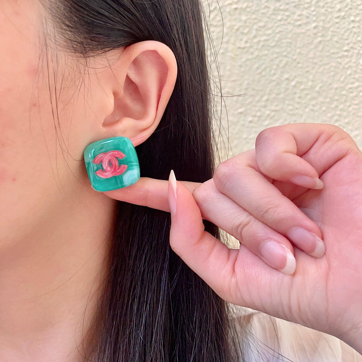 Martin Graham stud earrings in polished metal-tone – front product view