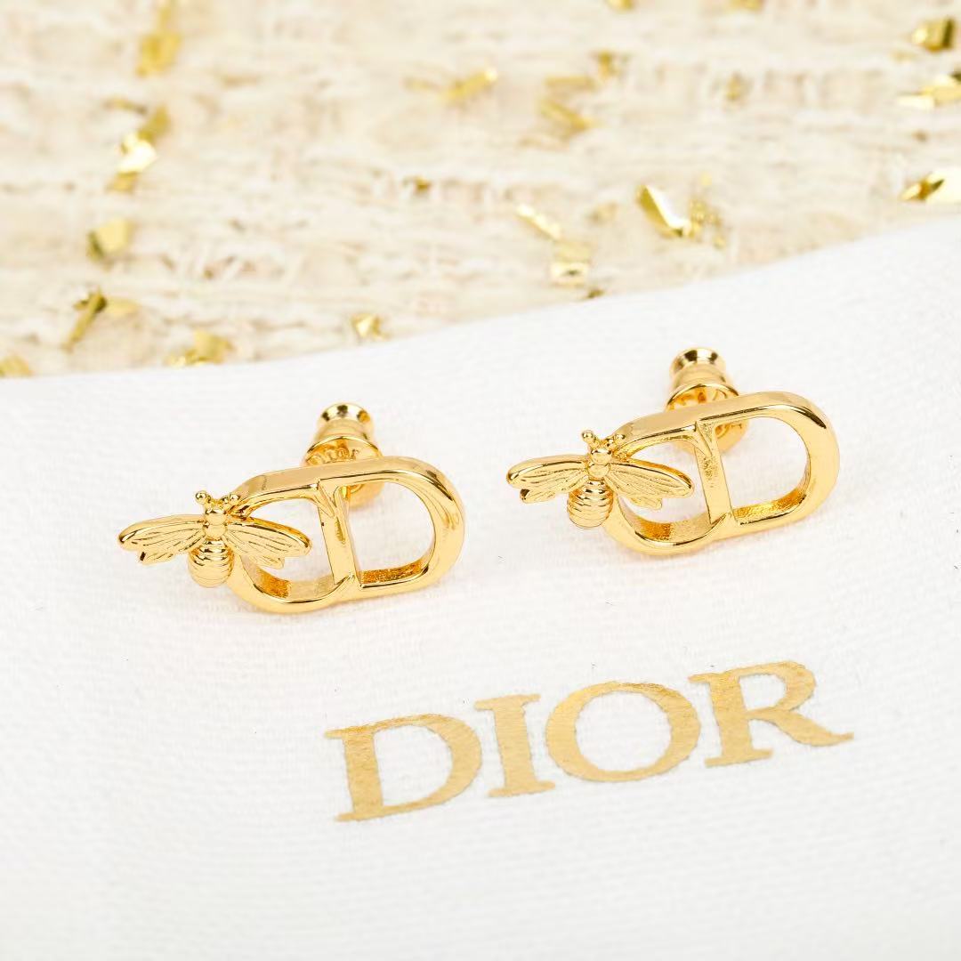 Martin Graham stud earrings in polished metal-tone – front view