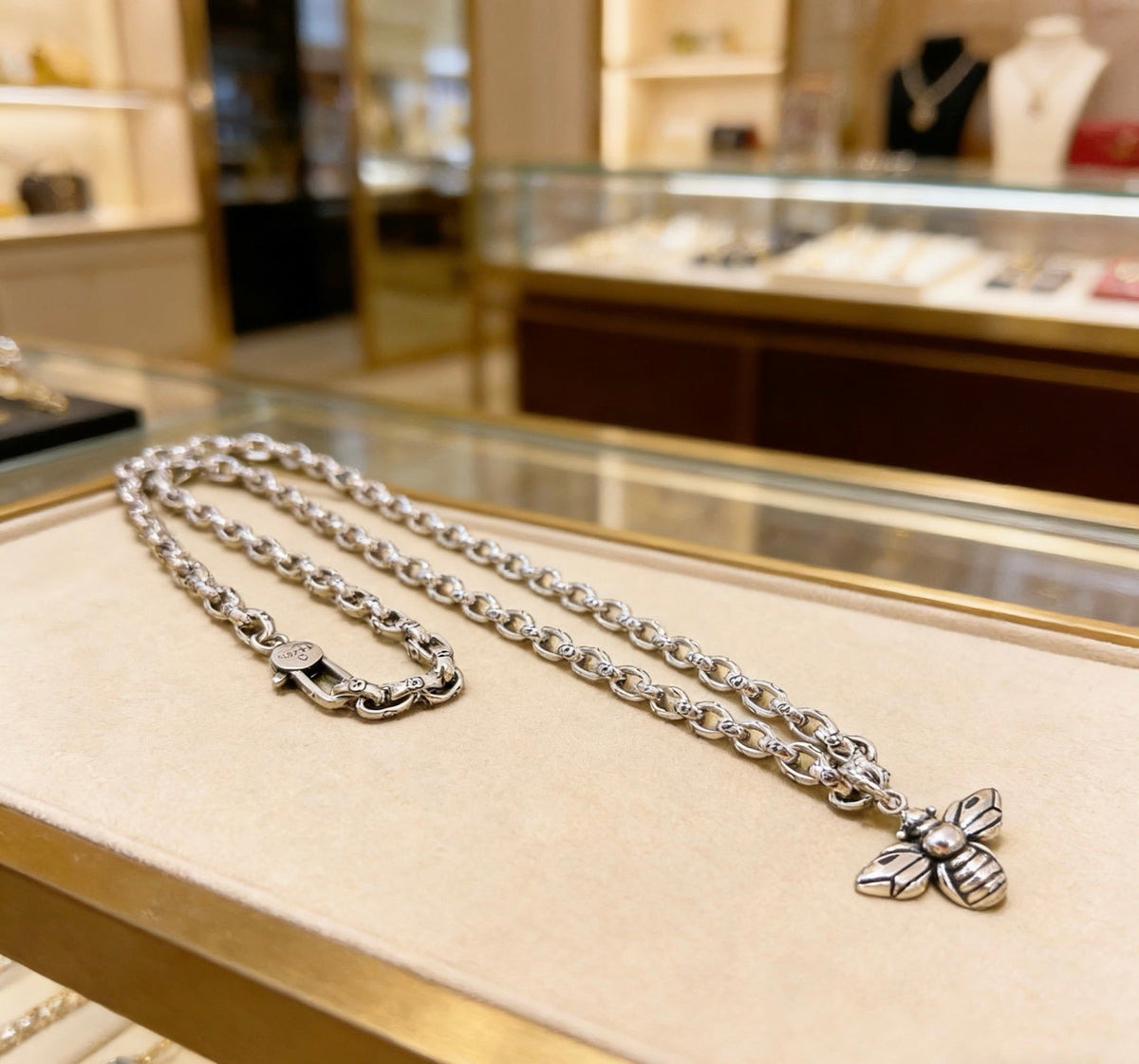 Martin Graham pendant necklace in polished metal-tone – front product view