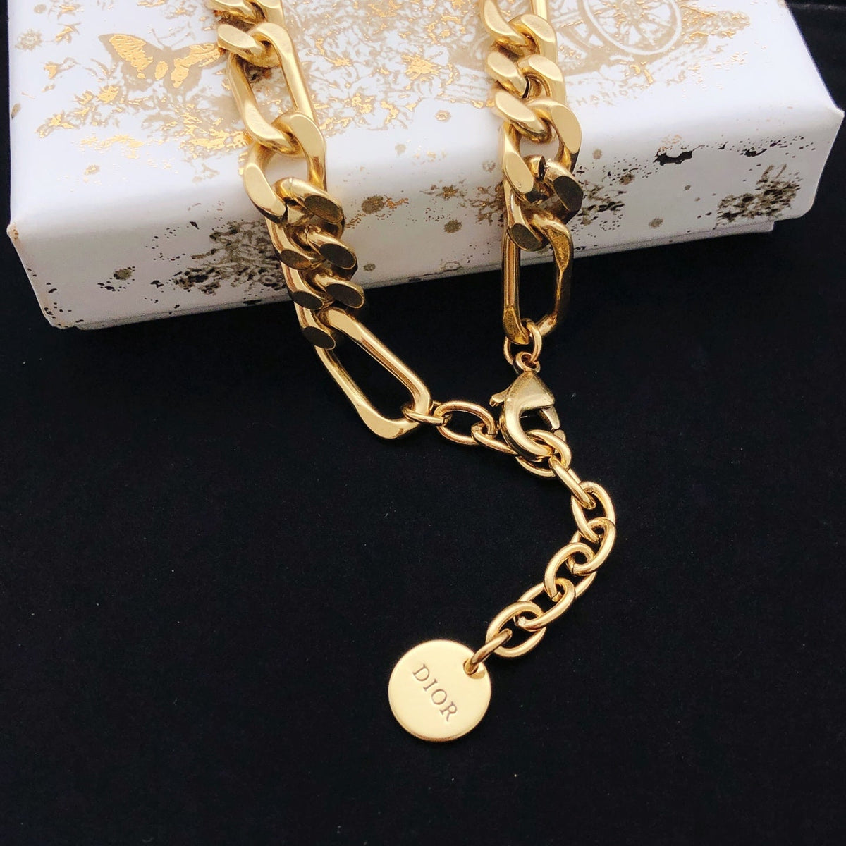 Martin Graham pendant necklace in polished metal-tone – front view