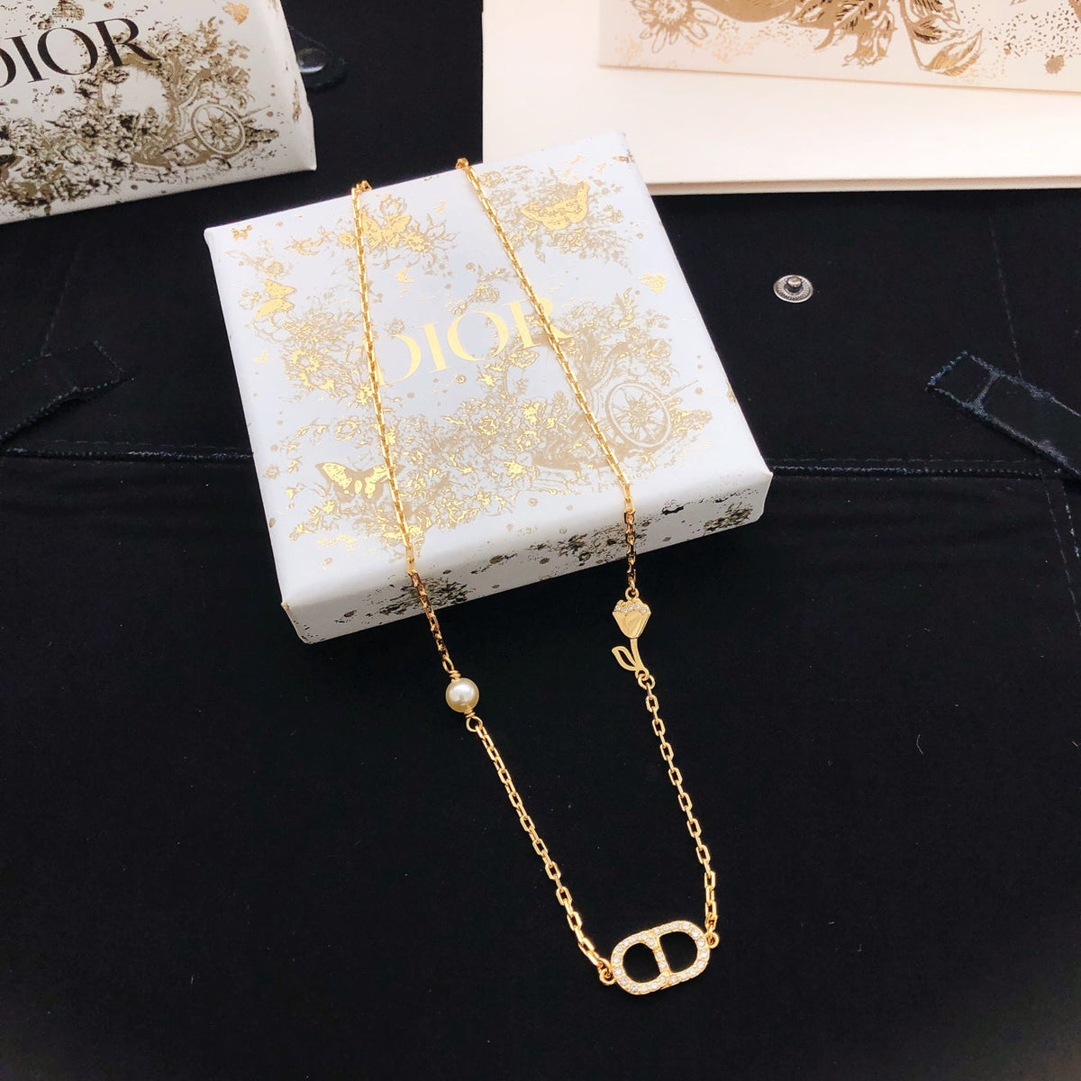 Martin Graham pendant necklace in polished metal-tone – front view