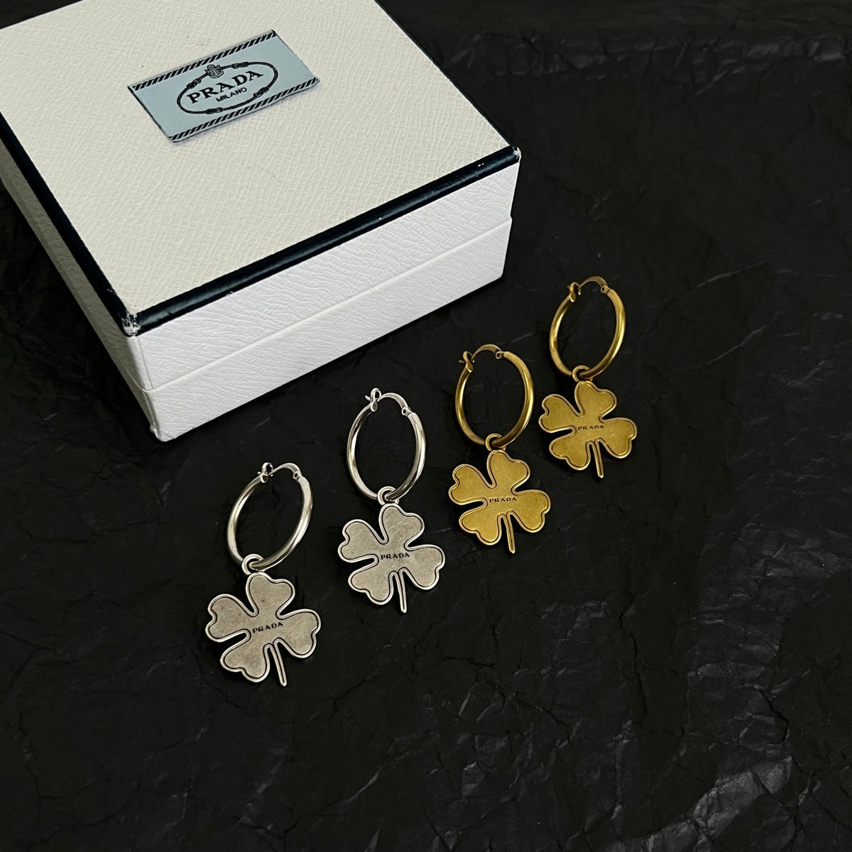Martin Graham earrings in polished metal-tone – front view