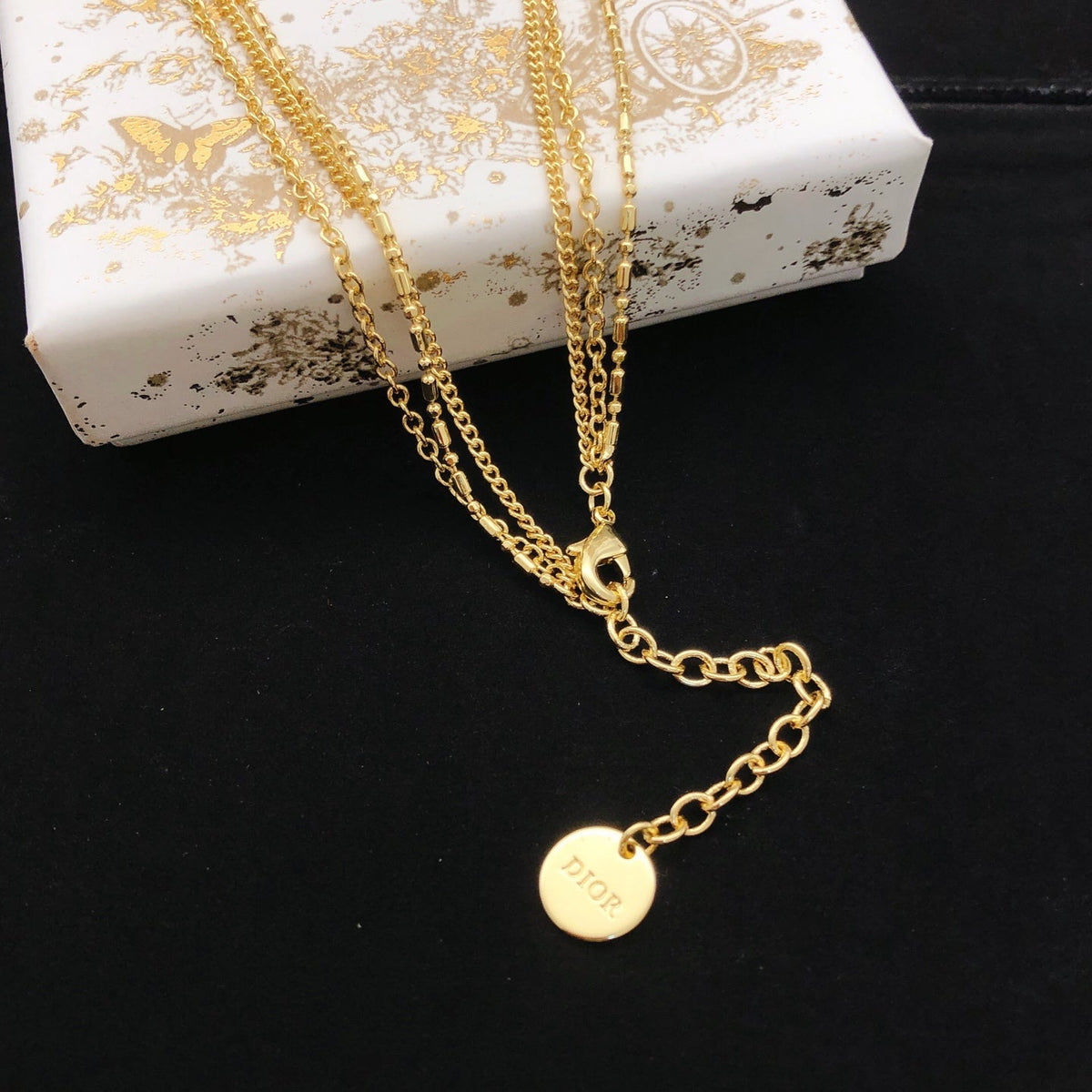 Martin Graham pendant necklace in polished metal-tone – front view