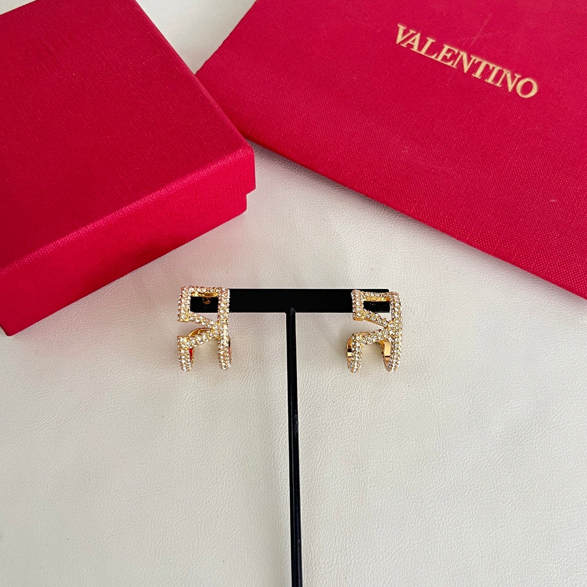 Martin Graham earrings in polished metal-tone – front view