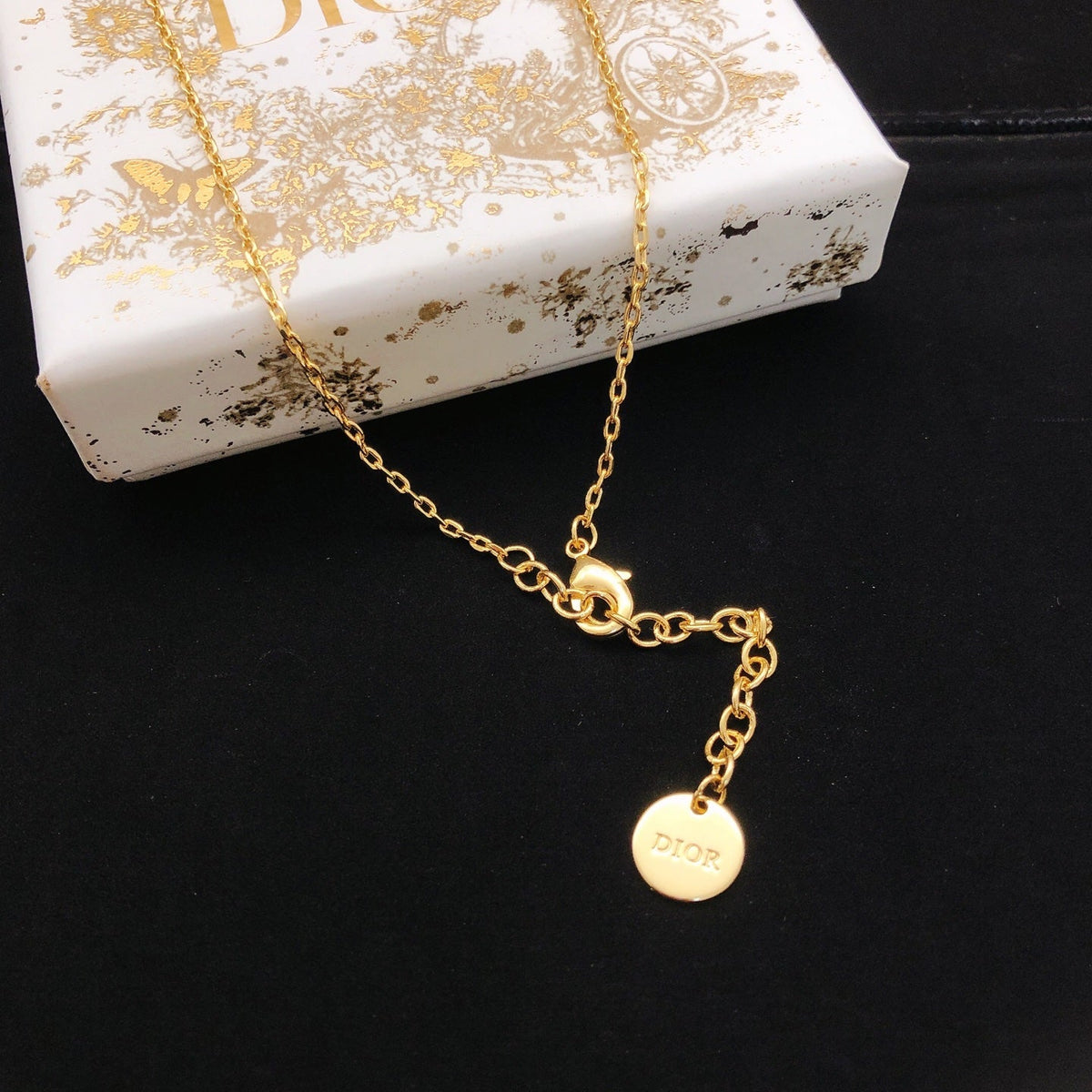 Martin Graham pendant necklace in polished metal-tone – front view