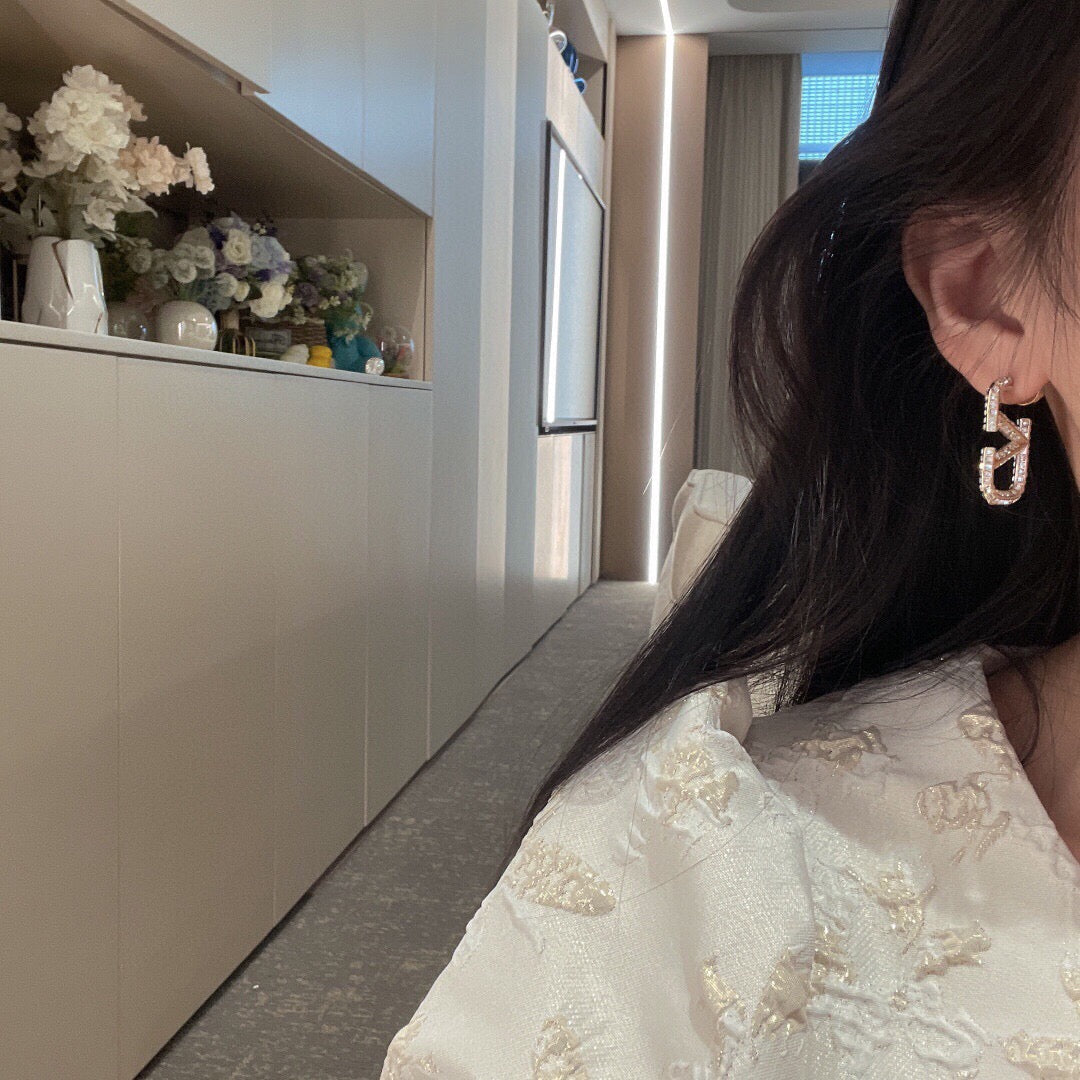 Martin Graham earrings in polished metal-tone – front view