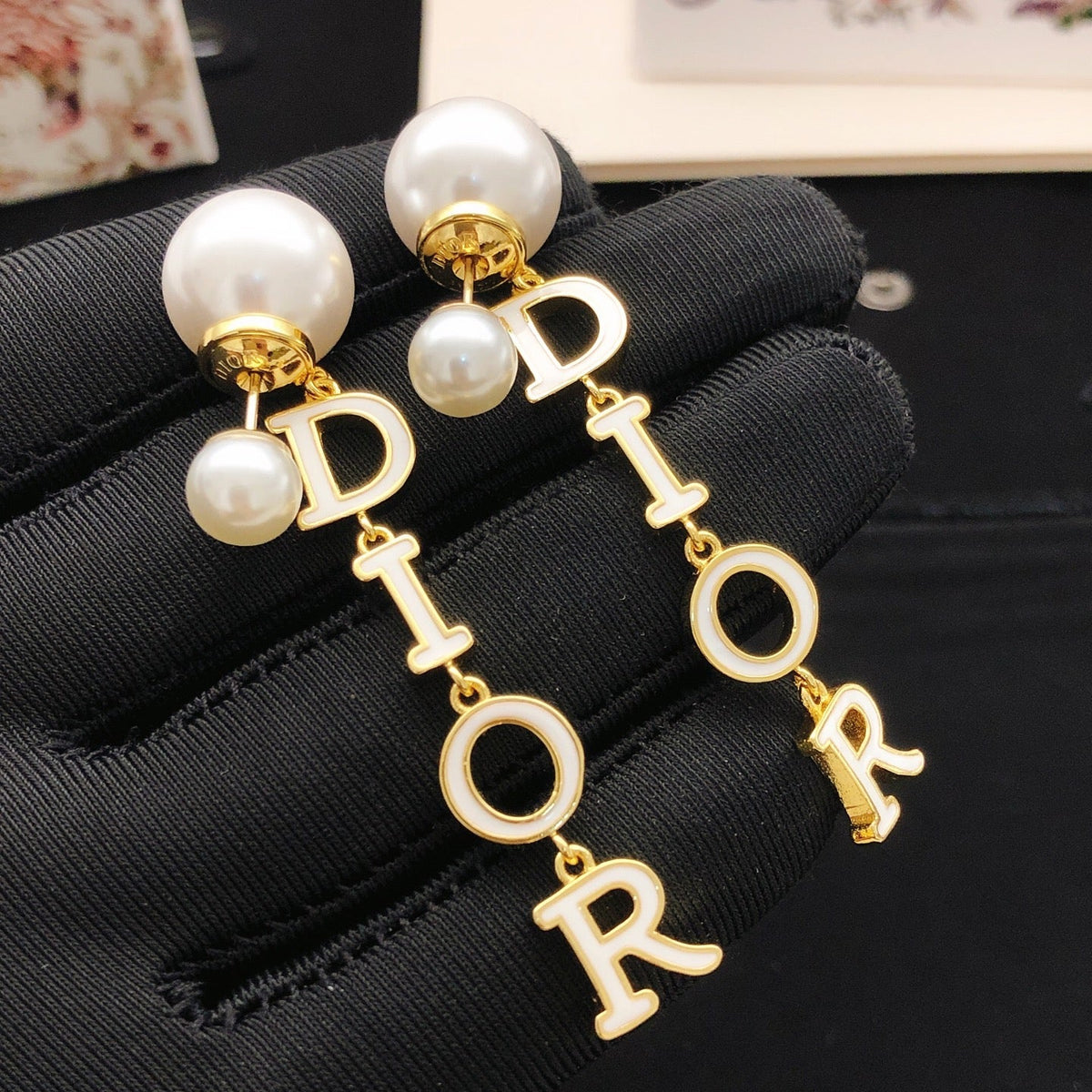 Martin Graham stud earrings in polished metal-tone – front view