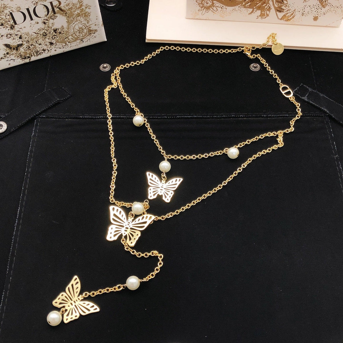 Martin Graham pendant necklace in polished metal-tone – front view