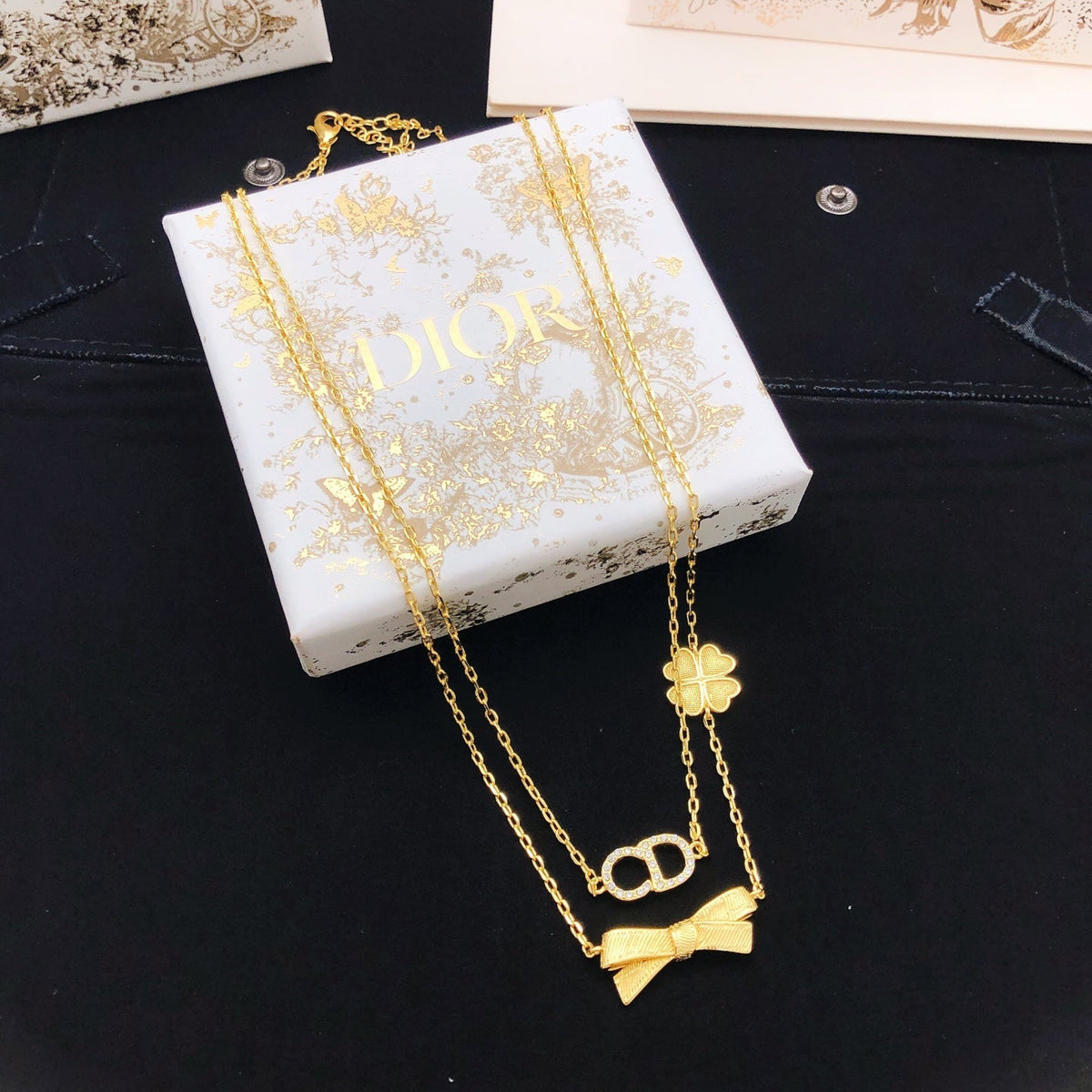 Martin Graham pendant necklace in polished metal-tone – front view