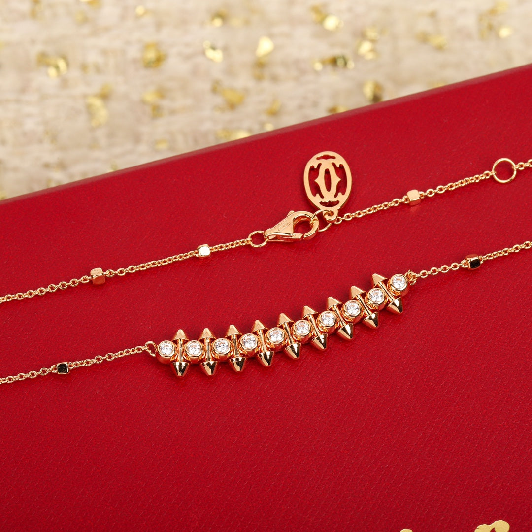 Martin Graham pendant necklace in polished metal-tone – front view