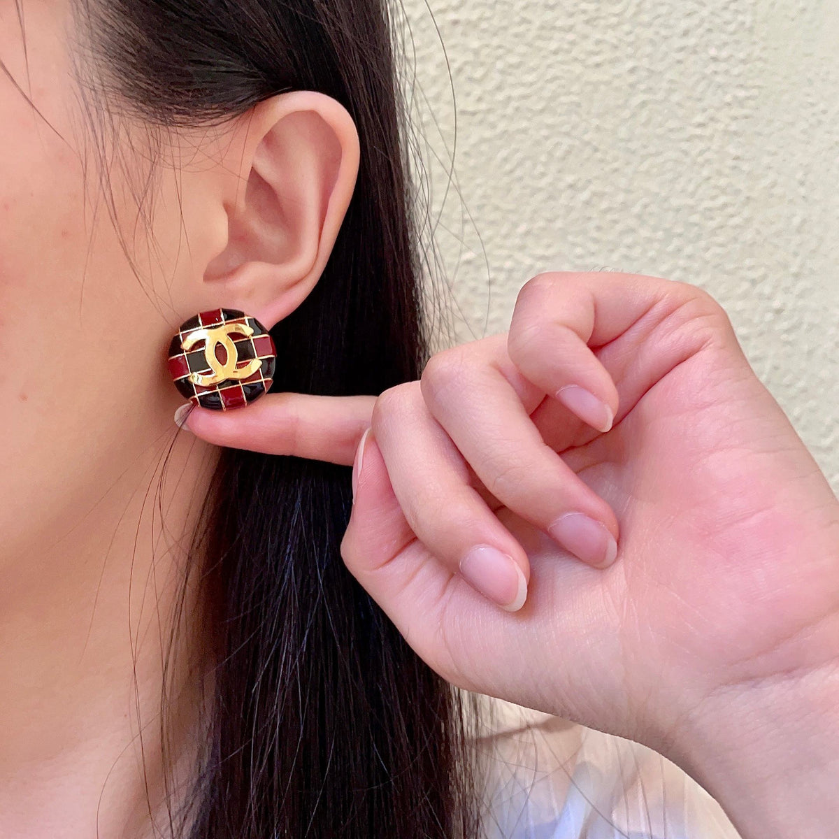 Martin Graham stud earrings in polished metal-tone – front product view