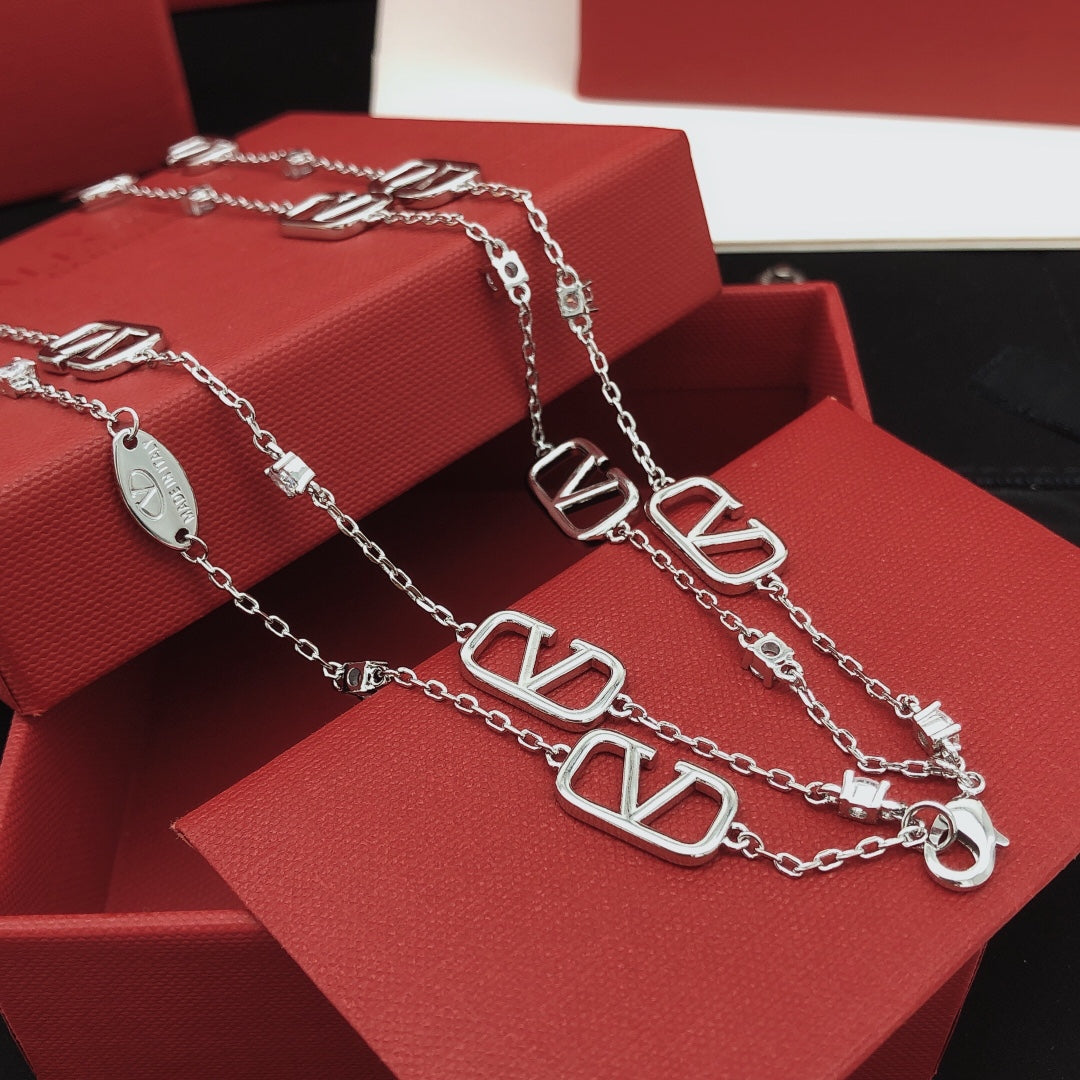 Martin Graham pendant necklace in polished metal-tone – front view