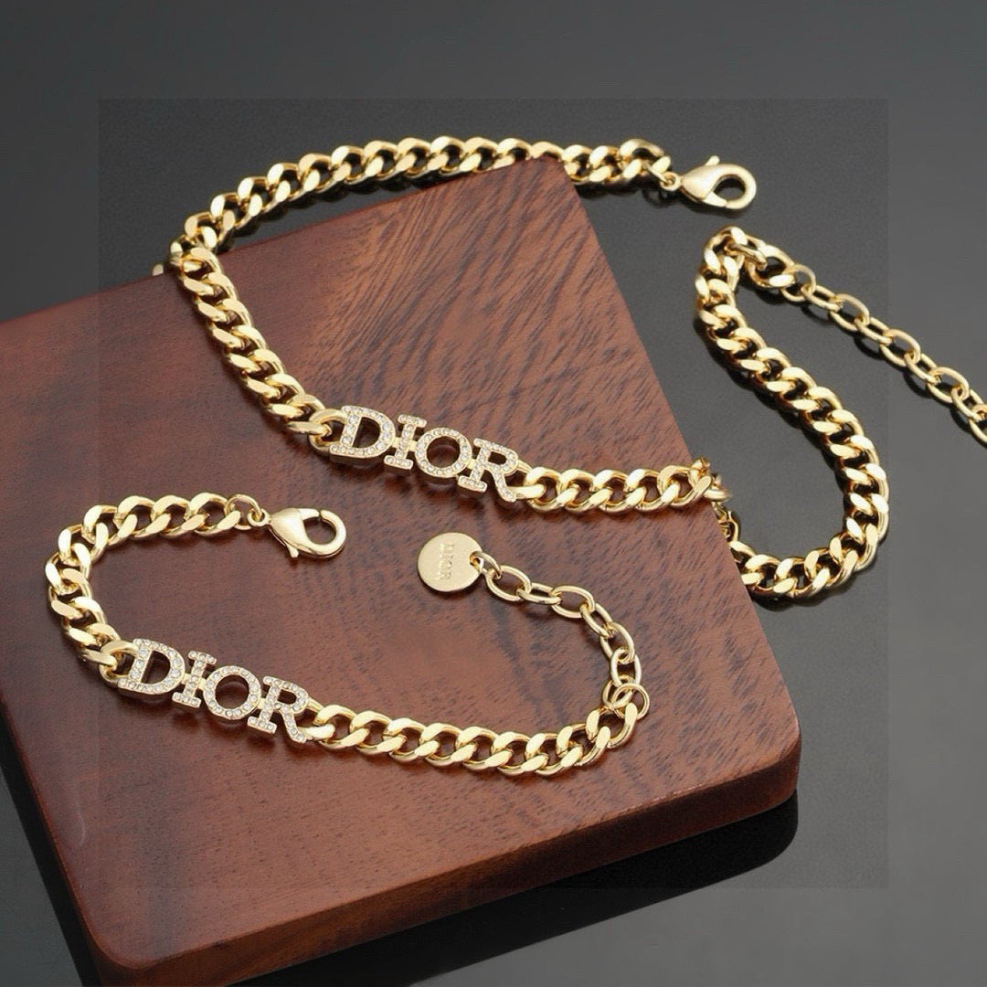 Martin Graham pendant necklace in polished metal-tone – front view