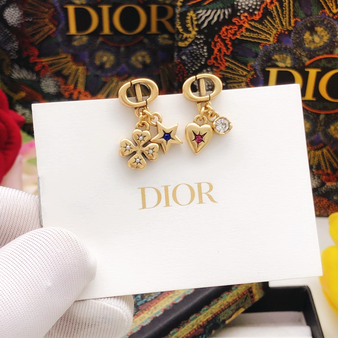 Martin Graham stud earrings in polished metal-tone – front view