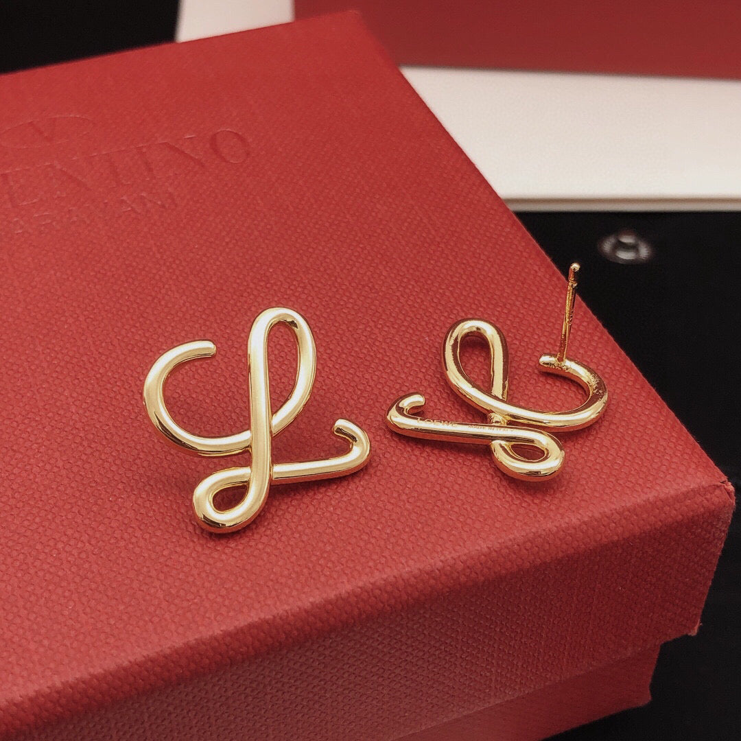 Martin Graham stud earrings in polished metal-tone – front view