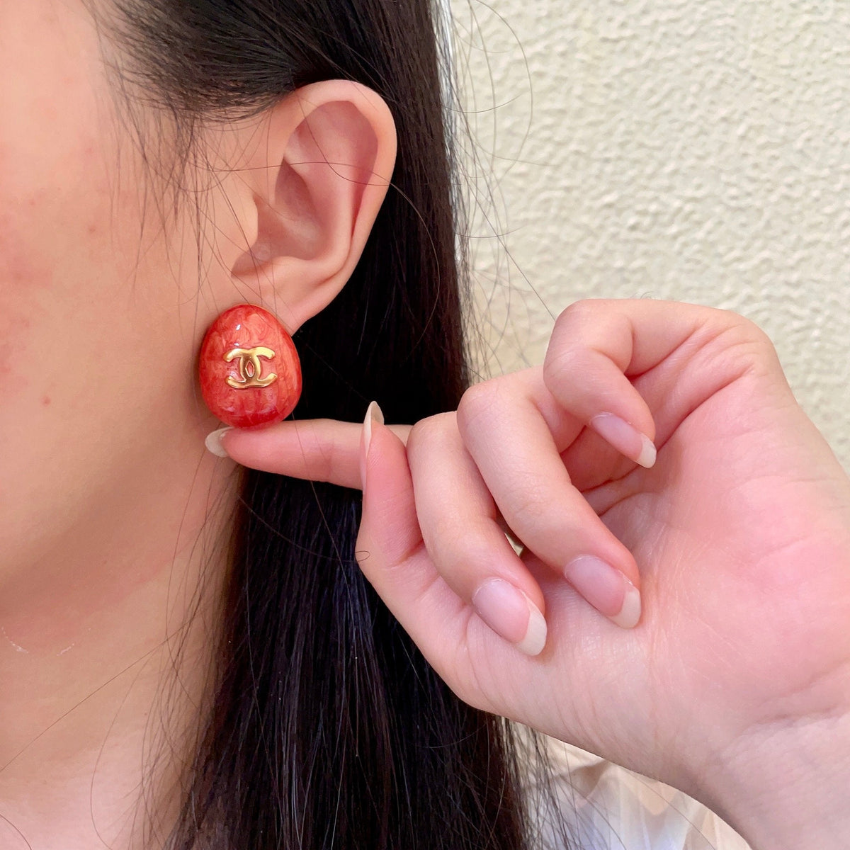 Martin Graham stud earrings in polished metal-tone – front product view