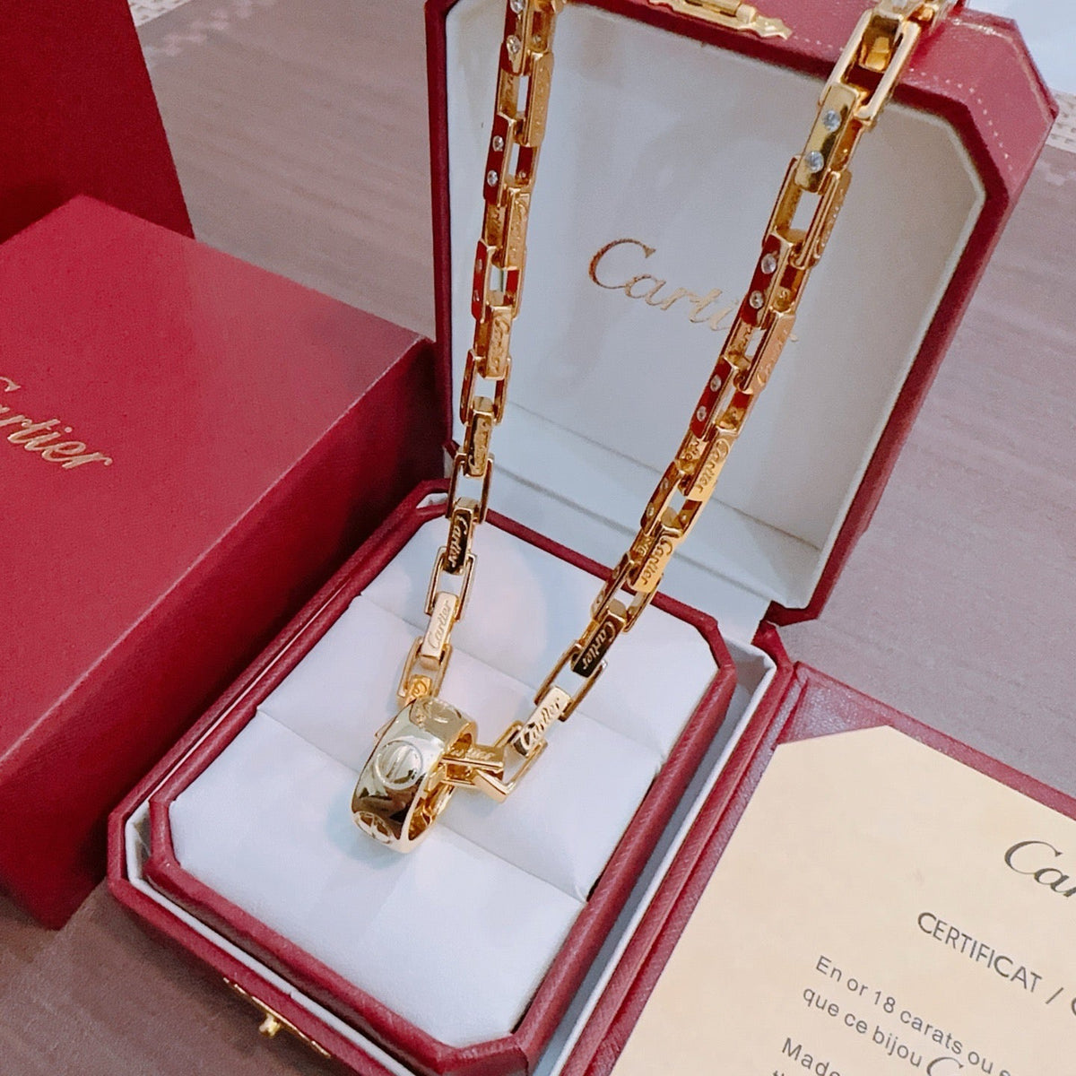 Martin Graham pendant necklace in polished metal-tone – front view
