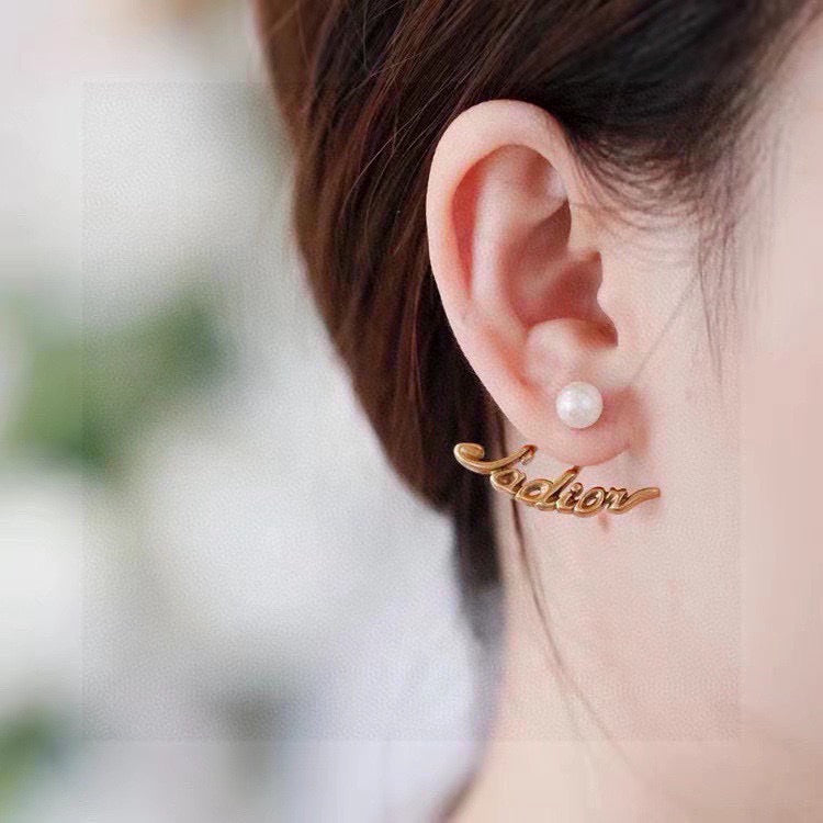 Martin Graham stud earrings in polished metal-tone – front view