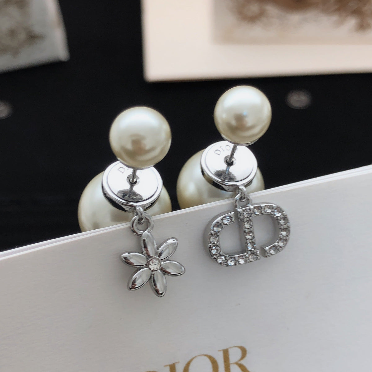 Martin Graham stud earrings in polished metal-tone – front view