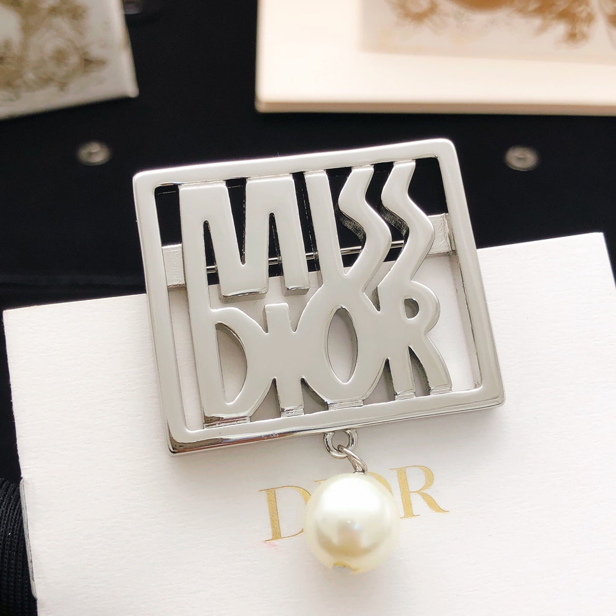 Martin Graham brooch in polished metal-tone – front view