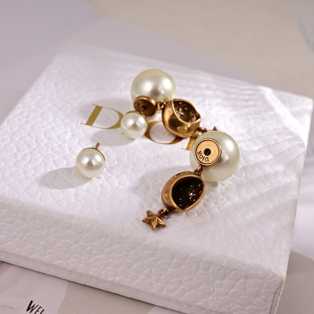 Martin Graham earrings in polished metal-tone – front view