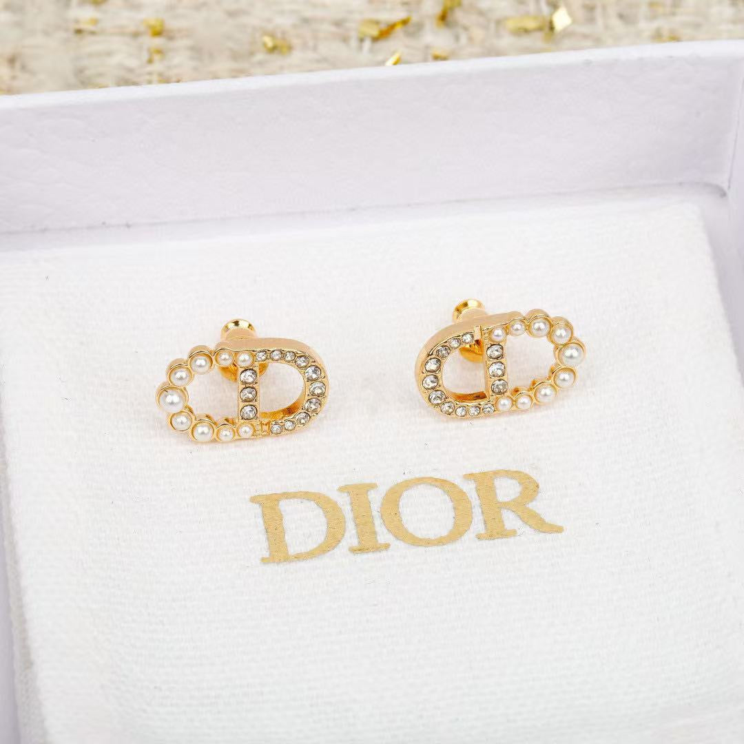 Martin Graham stud earrings in polished metal-tone – front view