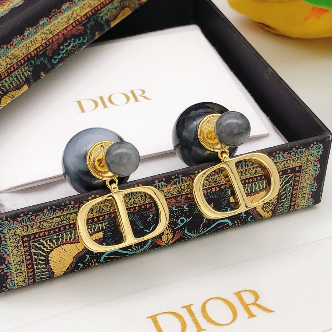 Martin Graham stud earrings in polished metal-tone – front view
