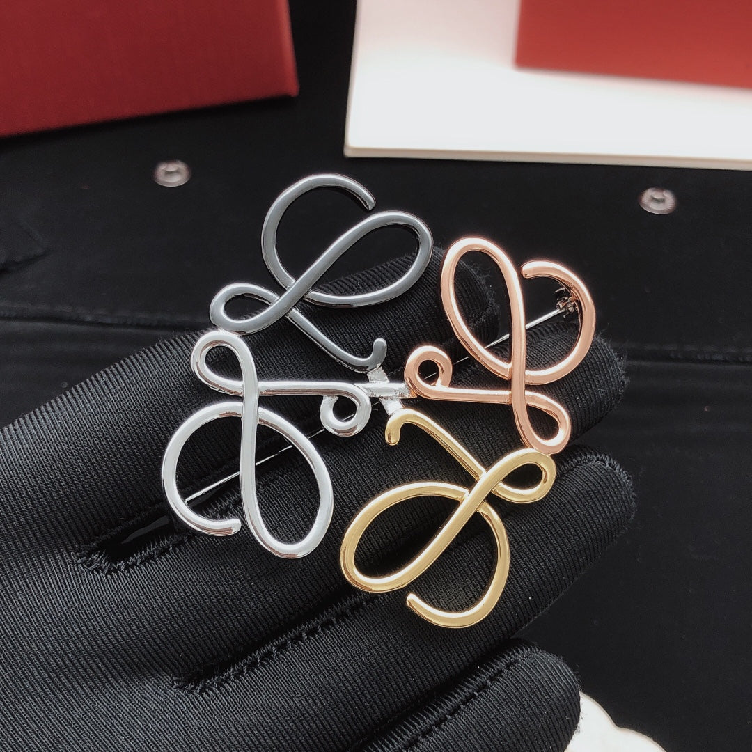 Martin Graham brooch in polished metal-tone – front view