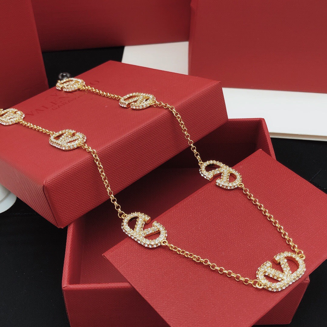 Martin Graham pendant necklace in polished metal-tone – front view