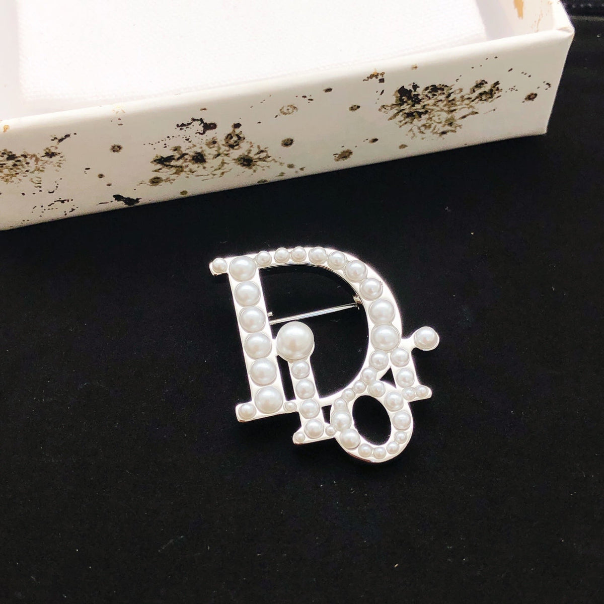 Martin Graham brooch in polished metal-tone – front view
