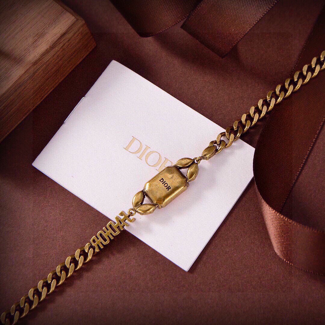 Martin Graham pendant necklace in polished metal-tone – front view