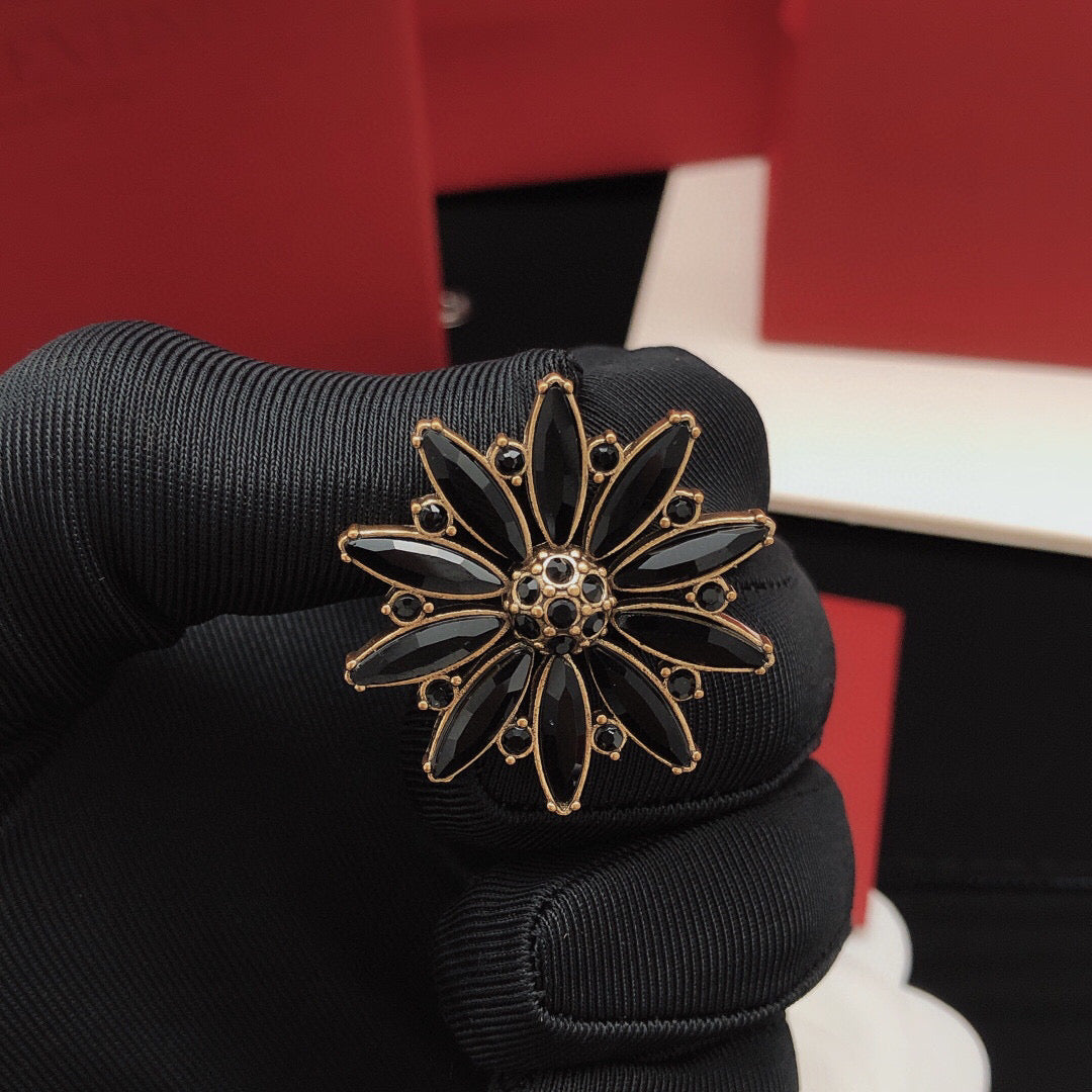 Martin Graham stud earrings in polished metal-tone – front product view