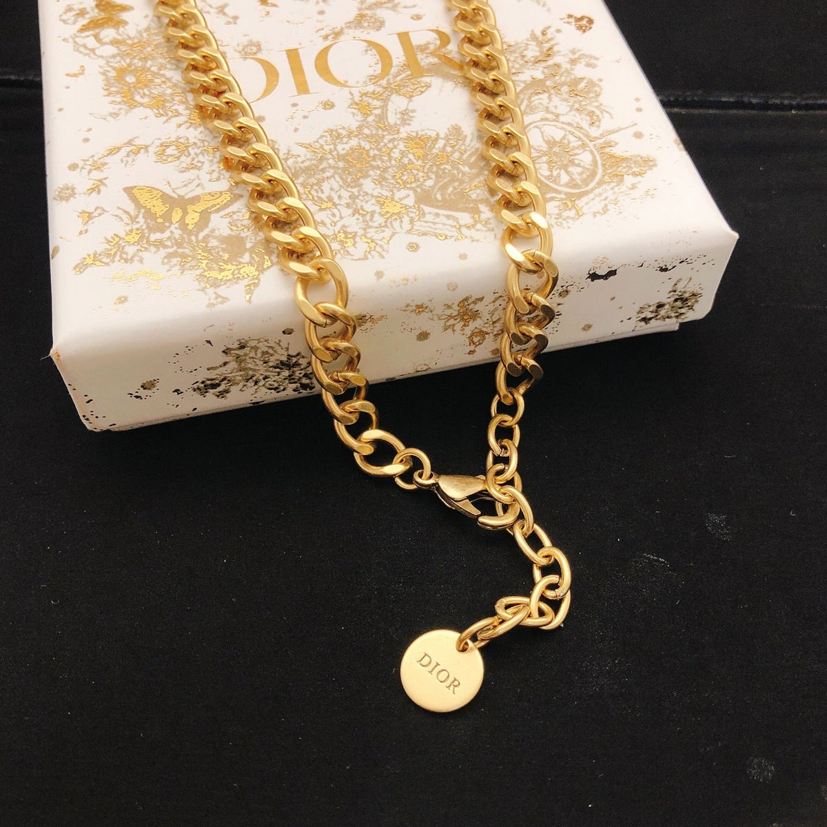 Martin Graham pendant necklace in polished metal-tone – front view