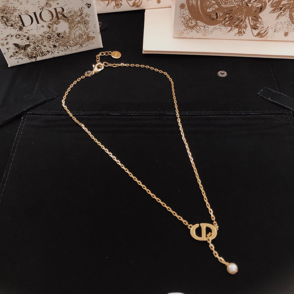Martin Graham pendant necklace in polished metal-tone – front view