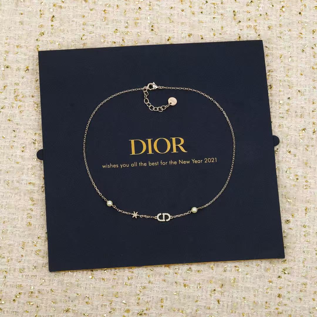 Martin Graham pendant necklace in polished metal-tone – front view