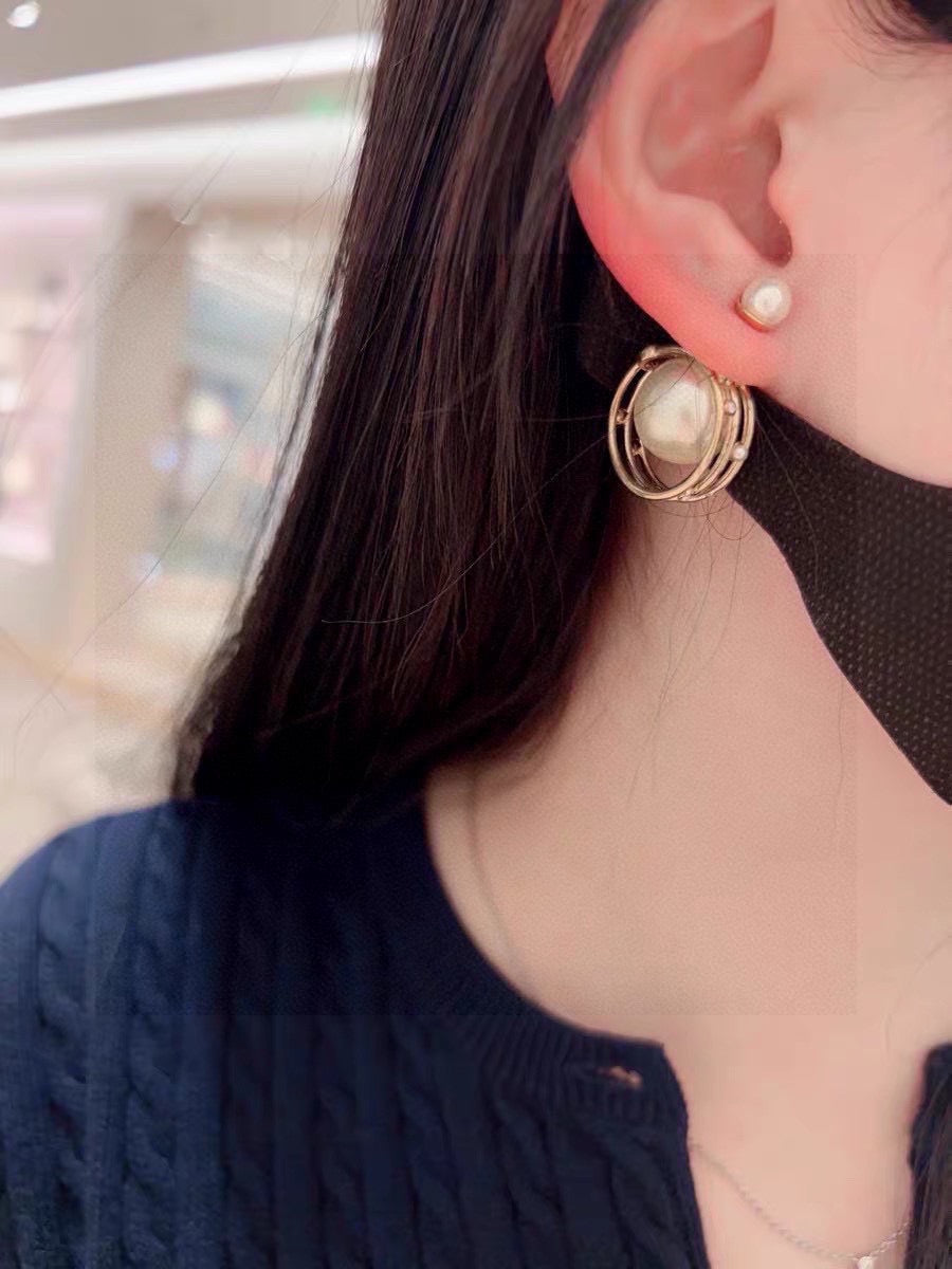 Martin Graham earrings in polished metal-tone – front view