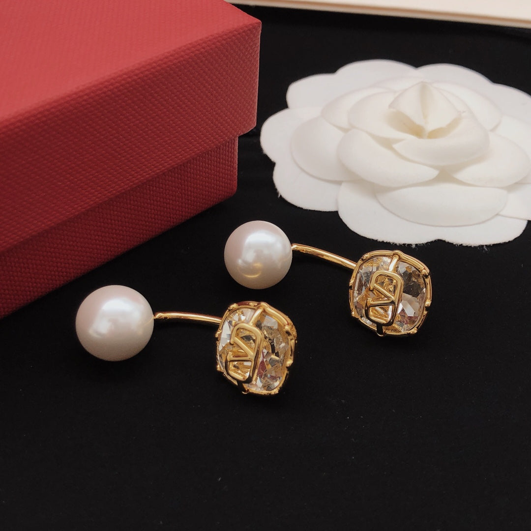 Martin Graham drop earrings in polished metal-tone – front view