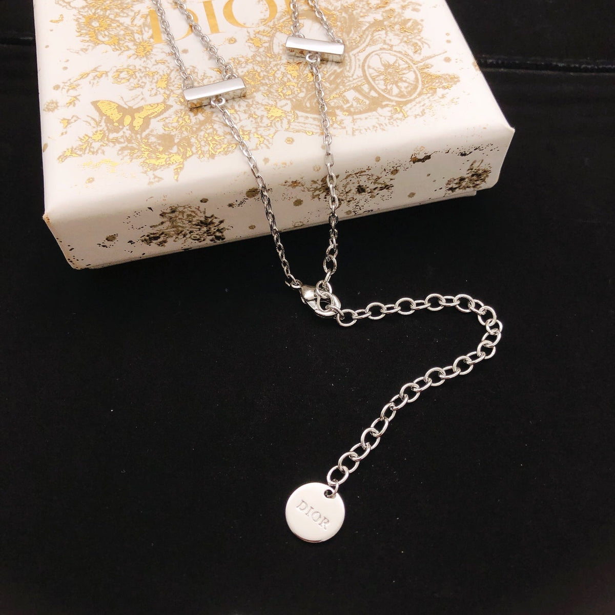 Martin Graham pendant necklace in polished metal-tone – front view