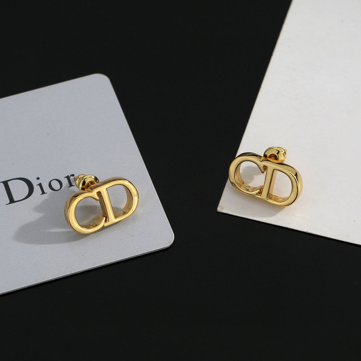Martin Graham earrings in polished metal-tone – front view