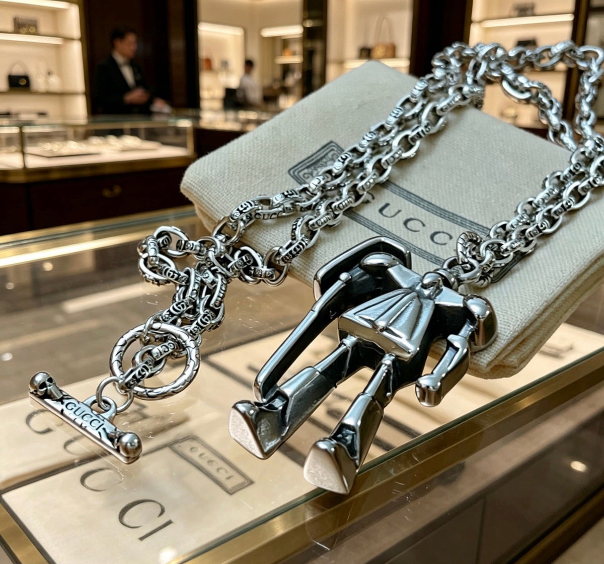 Martin Graham pendant necklace in polished metal-tone – front product view
