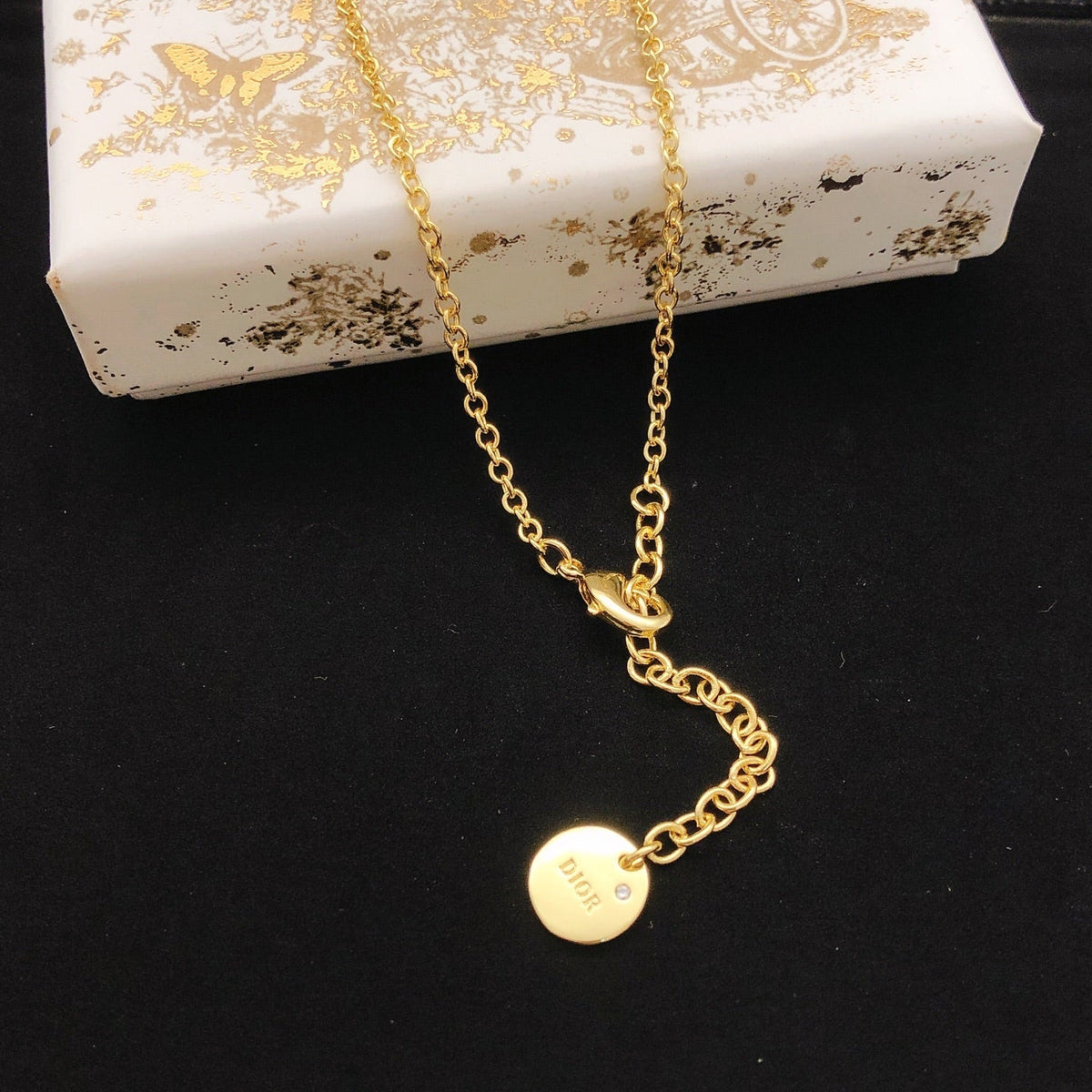 Martin Graham pendant necklace in polished metal-tone – front view