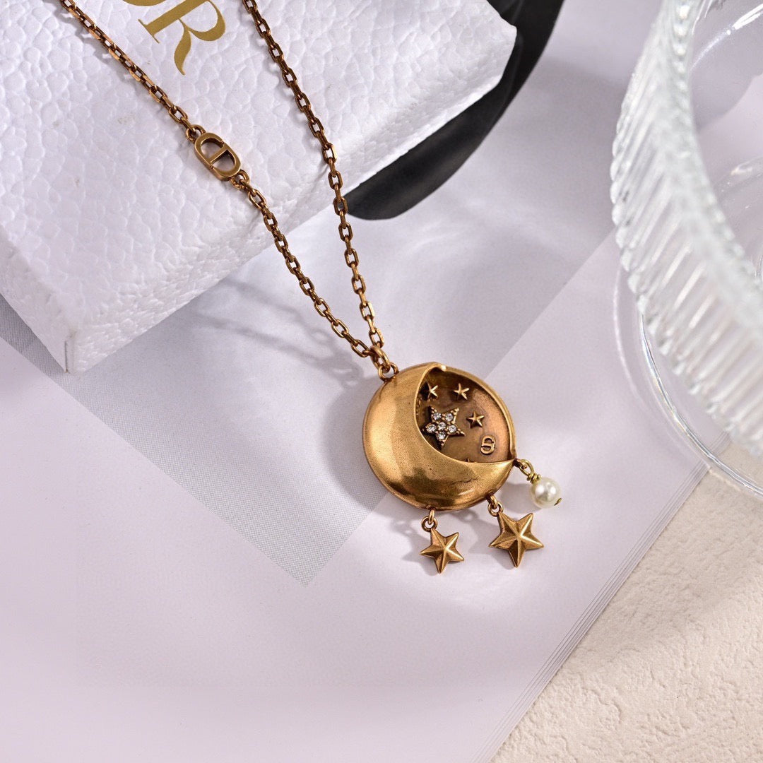 Martin Graham pendant necklace in polished metal-tone – front view
