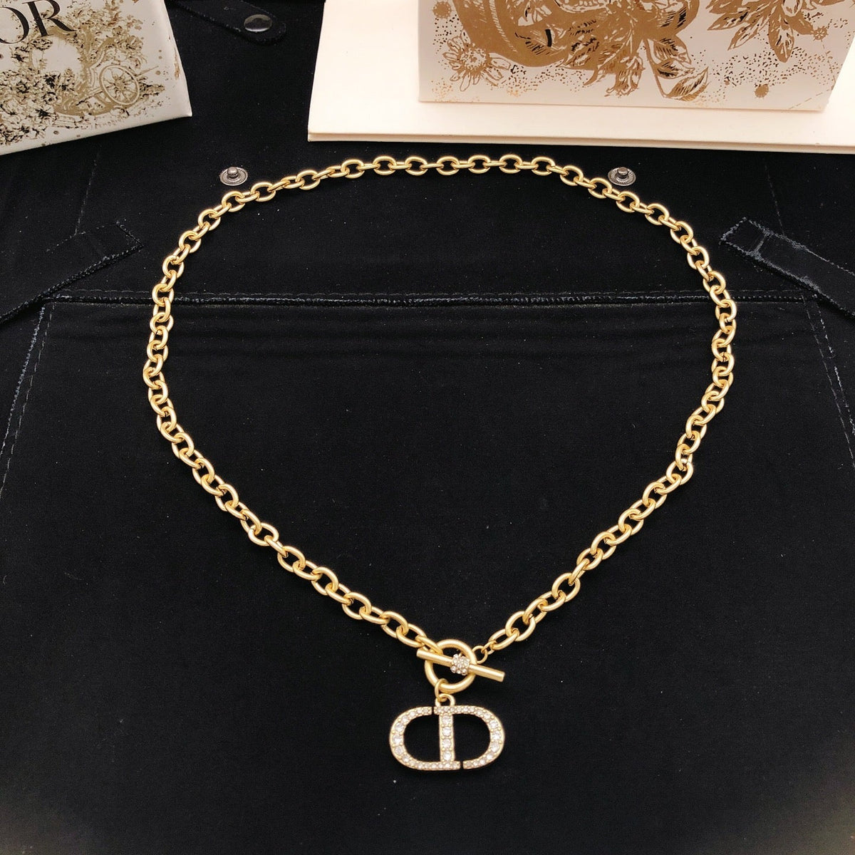 Martin Graham pendant necklace in polished metal-tone – front view