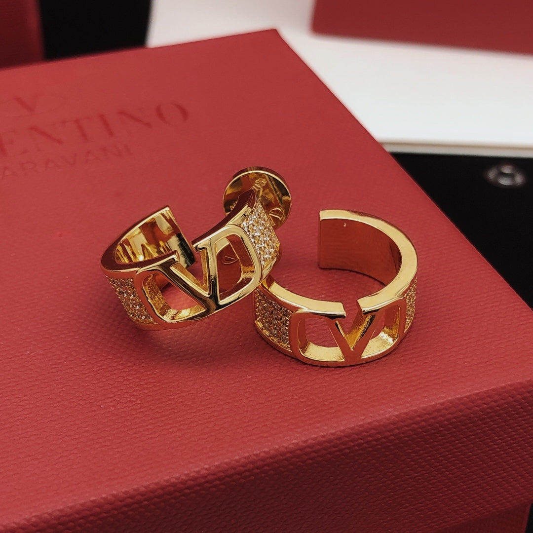 Martin Graham drop earrings in polished metal-tone – front view