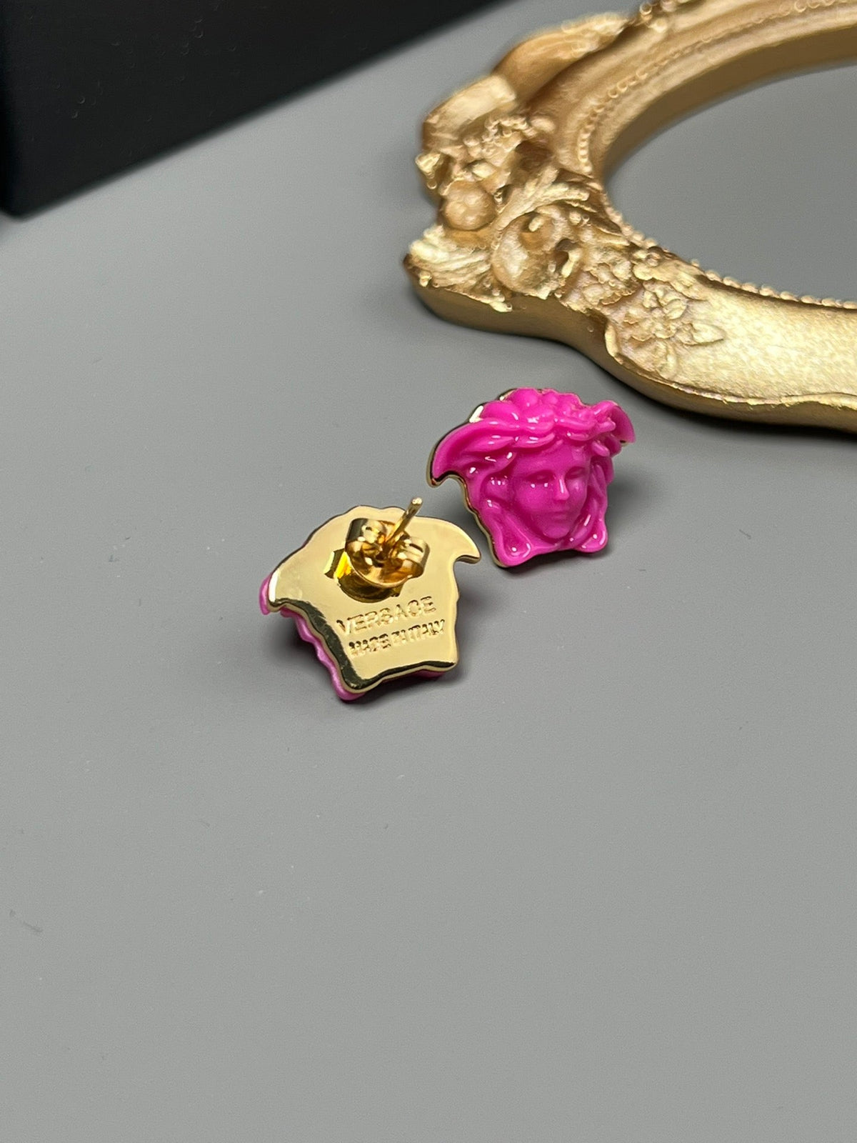 Martin Graham stud earrings in polished metal-tone – front product view
