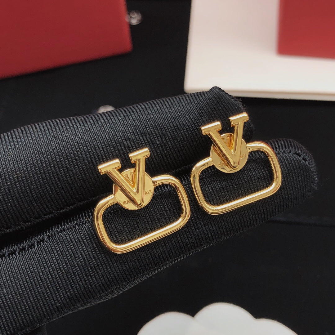 Martin Graham stud earrings in polished metal-tone – front view