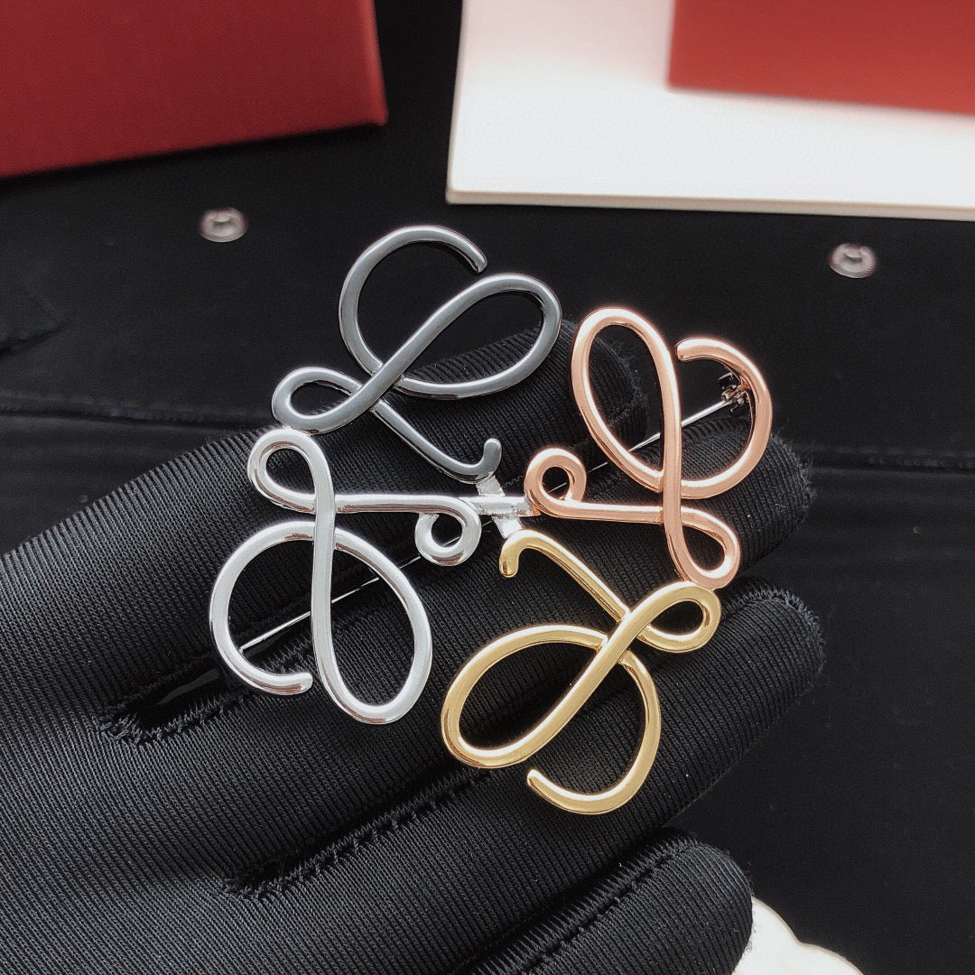Martin Graham brooch in polished metal-tone – front view