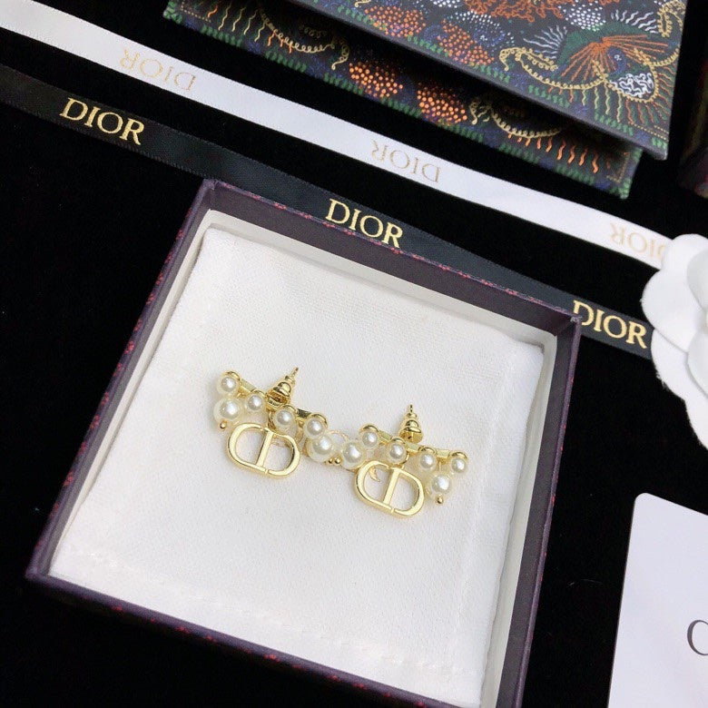 Martin Graham stud earrings in polished metal-tone – front view