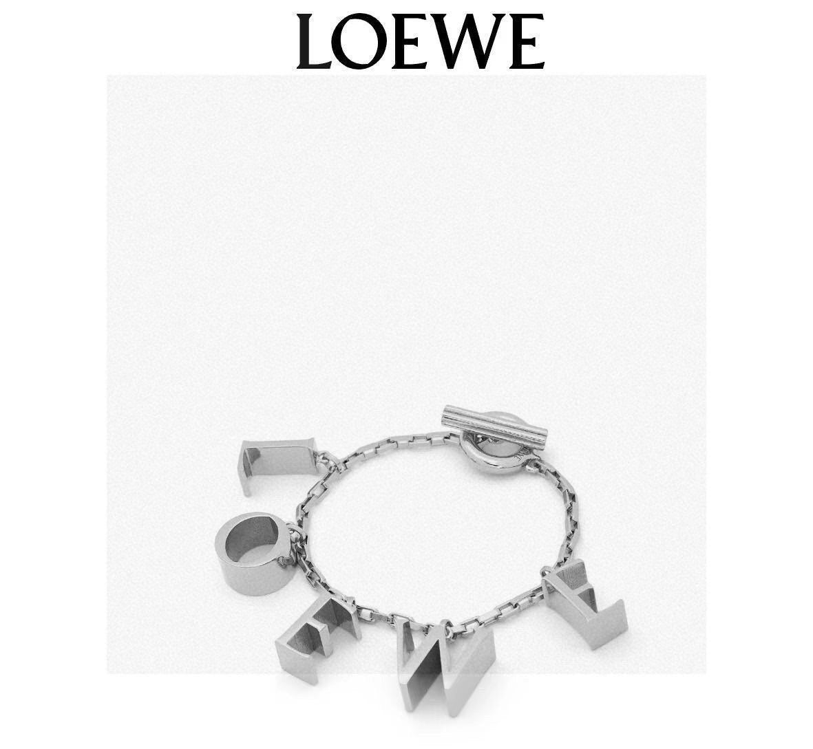 Martin Graham pendant necklace in polished metal-tone – detail view