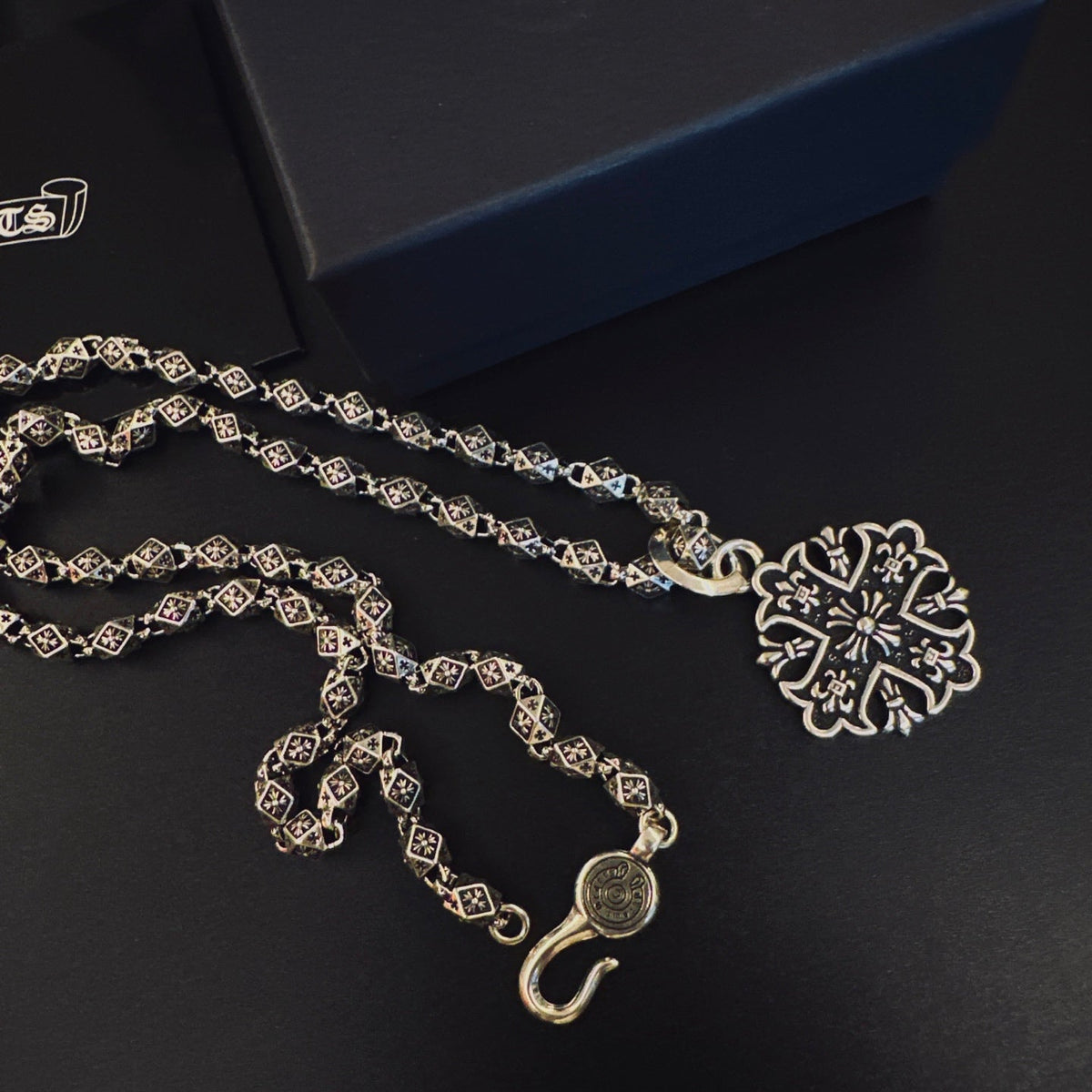 Martin Graham pendant necklace in polished metal-tone – detail view